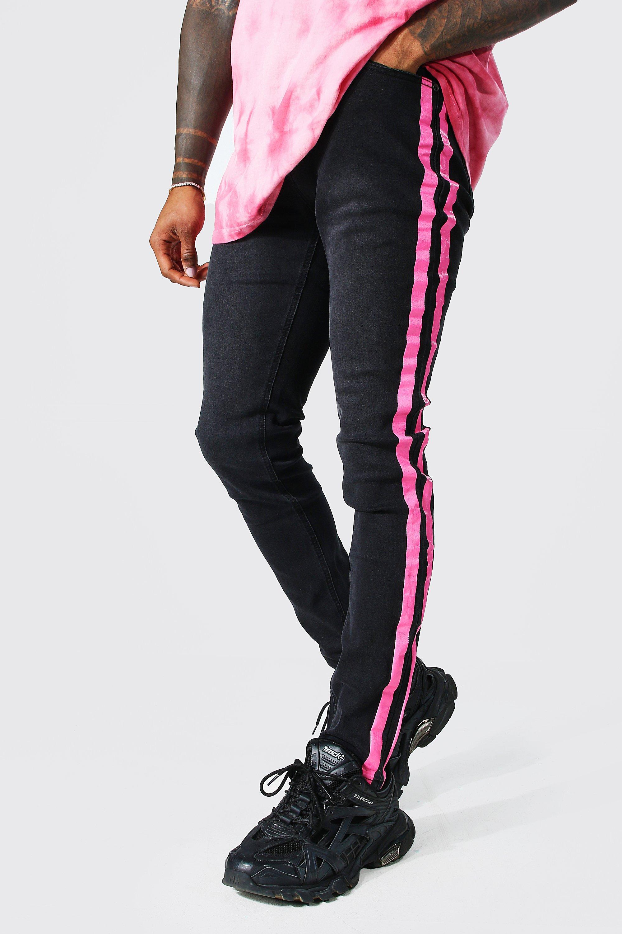 Black jeans with store pink stripe